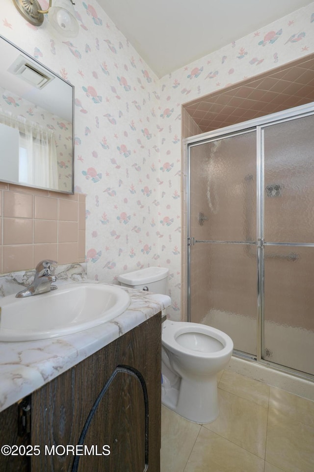 19 Clay Cir, Brick, NJ 08724 - bathroom with wallpapered walls, vanity, a stall shower, tile patterned flooring, and toilet
