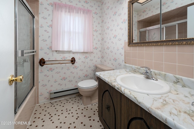 19 Clay Cir, Brick, NJ 08724 - full bath featuring a baseboard heating unit, vanity, toilet, wallpapered walls, and shower / bath combination with glass door