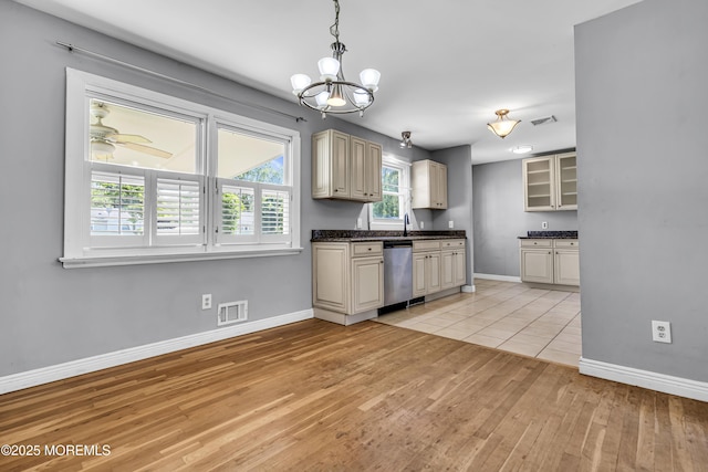 55 S Ave, Bayville, NJ 08721 - kitchen featuring stainless steel dishwasher, light wood-type flooring, and baseboards