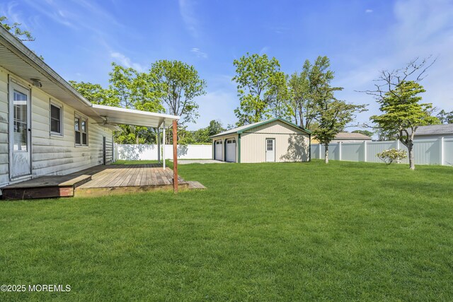 55 S Ave, Bayville, NJ 08721 - view of yard featuring a wooden deck, an outbuilding, and a garage