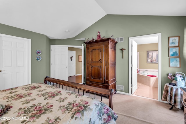 123 Skyline Dr, Lakewood, NJ 08701 - carpeted bedroom featuring lofted ceiling, baseboards, and connected bathroom