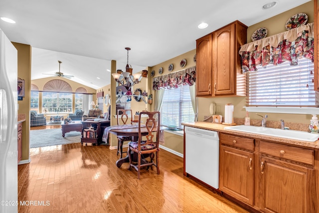 123 Skyline Dr, Lakewood, NJ 08701 - kitchen with a sink, dishwasher, light wood-type flooring, light countertops, and lofted ceiling