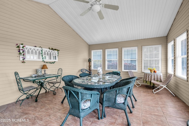123 Skyline Dr, Lakewood, NJ 08701 - sunroom featuring outdoor dining area, lofted ceiling, healthy amount of natural light, tile patterned floors, and wood walls