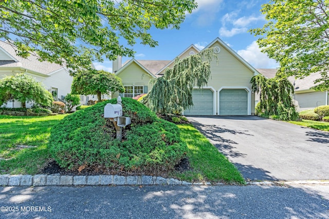 123 Skyline Dr, Lakewood, NJ 08701 - obstructed view of property featuring driveway and an attached garage
