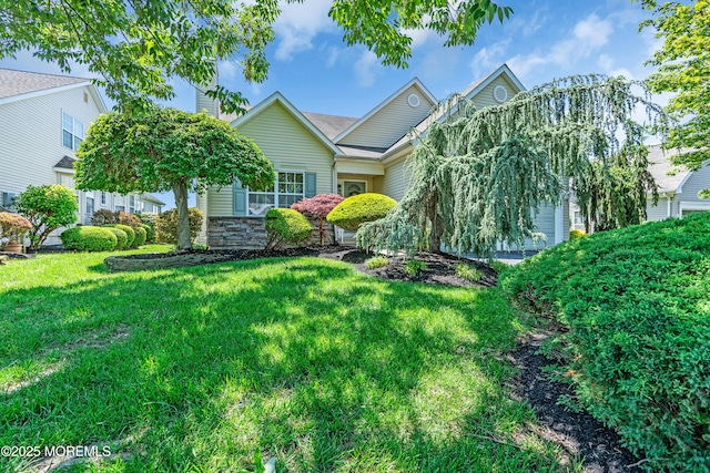 123 Skyline Dr, Lakewood, NJ 08701 - view of front of home with a front yard and stone siding