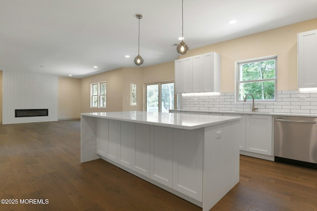 830 Hulses Corner Rd, Howell, NJ 07731 - kitchen featuring dishwasher, a kitchen island, wood finished floors, healthy amount of natural light, and recessed lighting