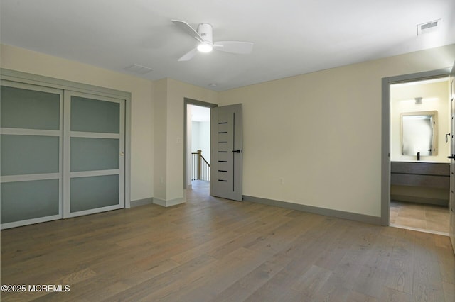 830 Hulses Corner Rd, Howell, NJ 07731 - empty room with ceiling fan and light wood finished floors
