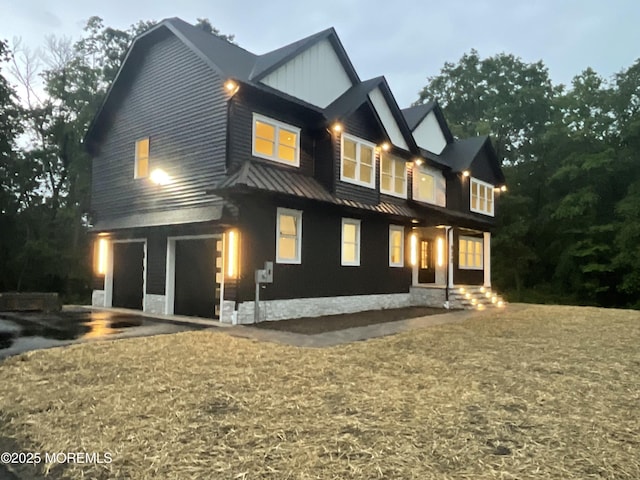 830 Hulses Corner Rd, Howell, NJ 07731 - rear view of property with a standing seam roof, a metal roof, and board and batten siding