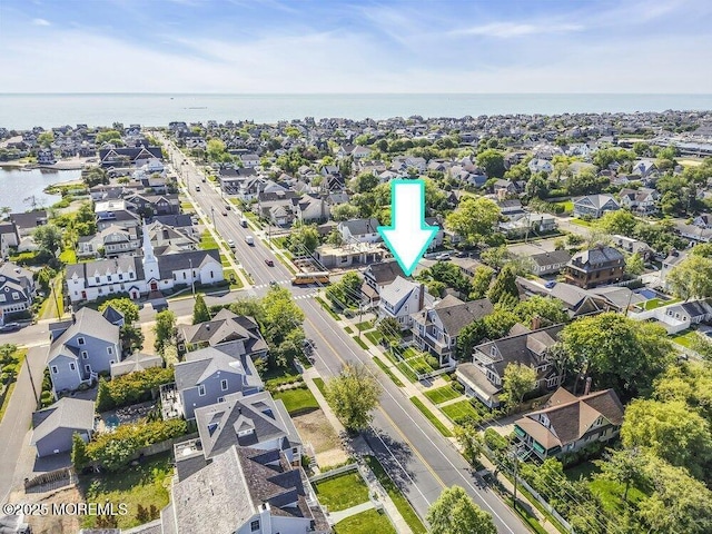 129 Bridge Ave, Bay Head, NJ 08742 - aerial view of property and surrounding area featuring nearby suburban area and a large body of water