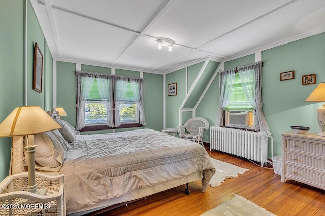 129 Bridge Ave, Bay Head, NJ 08742 - bedroom with radiator, multiple windows, hardwood / wood-style floors, and crown molding