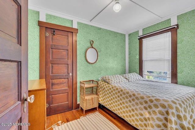 129 Bridge Ave, Bay Head, NJ 08742 - bedroom featuring wood finished floors and ornamental molding