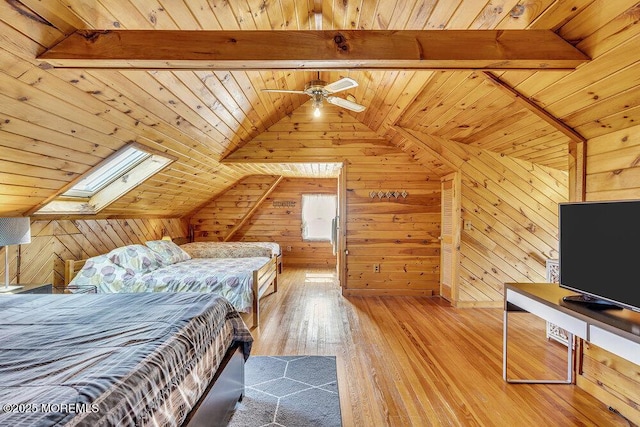 129 Bridge Ave, Bay Head, NJ 08742 - bedroom featuring wooden walls, wooden ceiling, hardwood / wood-style flooring, and a skylight