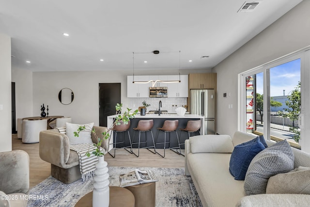 401 Boulevard 201, Seaside Heights, NJ 08751 - living room with light wood finished floors and recessed lighting