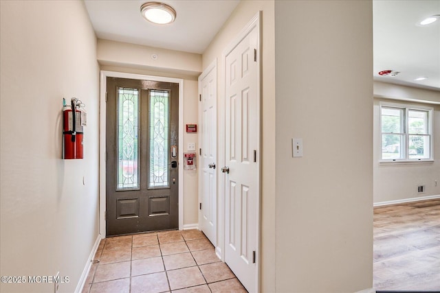 44 Oak Ter, Howell, NJ 07731 - entryway featuring baseboards, recessed lighting, and light tile patterned floors