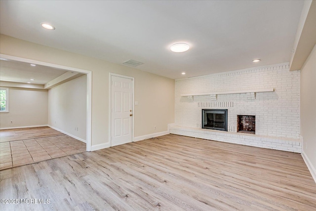 44 Oak Ter, Howell, NJ 07731 - unfurnished living room featuring wood finished floors, a fireplace, baseboards, and recessed lighting