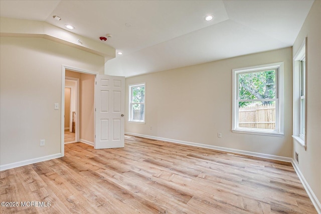44 Oak Ter, Howell, NJ 07731 - empty room with light wood-style flooring, healthy amount of natural light, lofted ceiling, recessed lighting, and baseboards