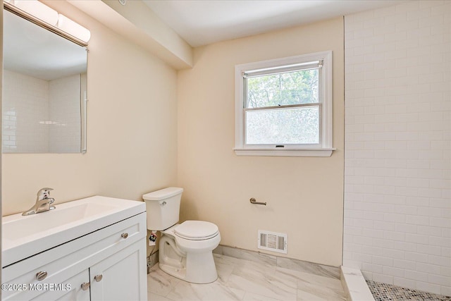 44 Oak Ter, Howell, NJ 07731 - full bath featuring toilet, vanity, marble finish flooring, and a tile shower