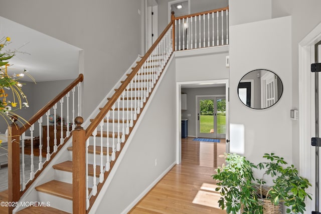 69 Eayrestown Rd, Medford, NJ 08055 - stairs with wood finished floors, baseboards, and a towering ceiling