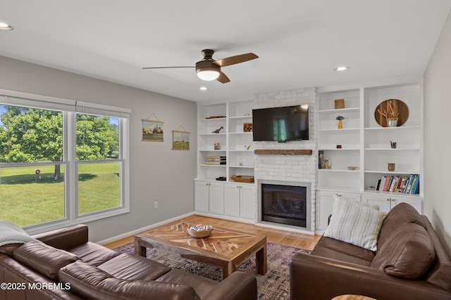 69 Eayrestown Rd, Medford, NJ 08055 - living room with a ceiling fan, baseboards, wood finished floors, a brick fireplace, and recessed lighting