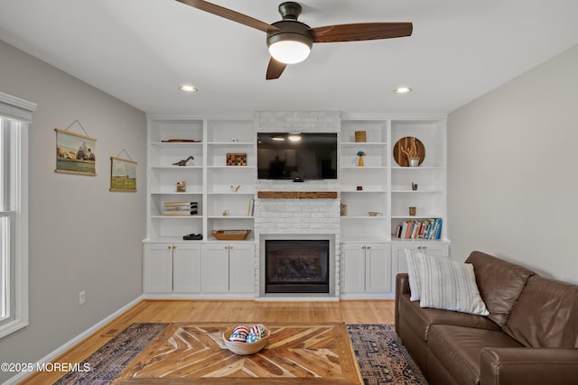 69 Eayrestown Rd, Medford, NJ 08055 - living area featuring light wood-style floors, a ceiling fan, a brick fireplace, baseboards, and recessed lighting