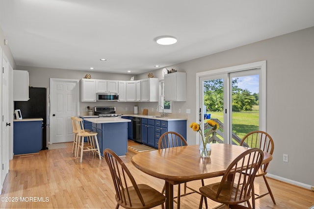 69 Eayrestown Rd, Medford, NJ 08055 - dining area with light wood-style flooring, recessed lighting, and baseboards