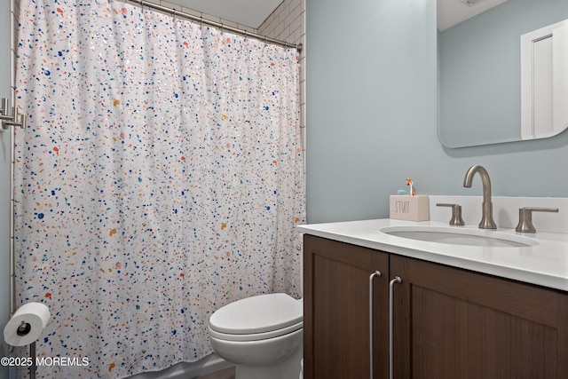 69 Eayrestown Rd, Medford, NJ 08055 - bathroom featuring vanity, toilet, and curtained shower