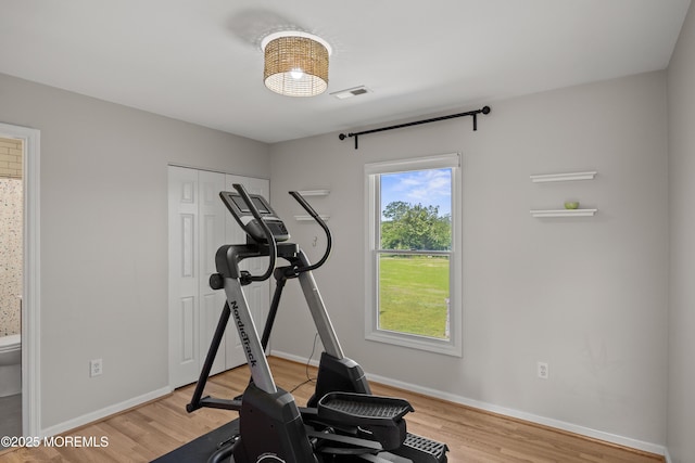 69 Eayrestown Rd, Medford, NJ 08055 - exercise room with light wood-type flooring and baseboards