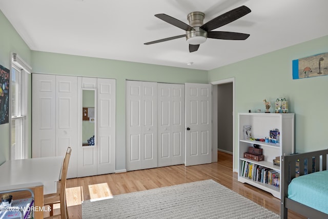 69 Eayrestown Rd, Medford, NJ 08055 - bedroom featuring two closets, wood finished floors, and ceiling fan