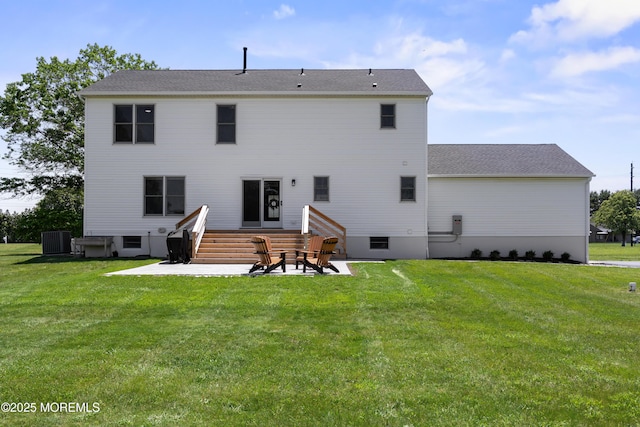69 Eayrestown Rd, Medford, NJ 08055 - rear view of property featuring entry steps, central AC, a lawn, and a patio area