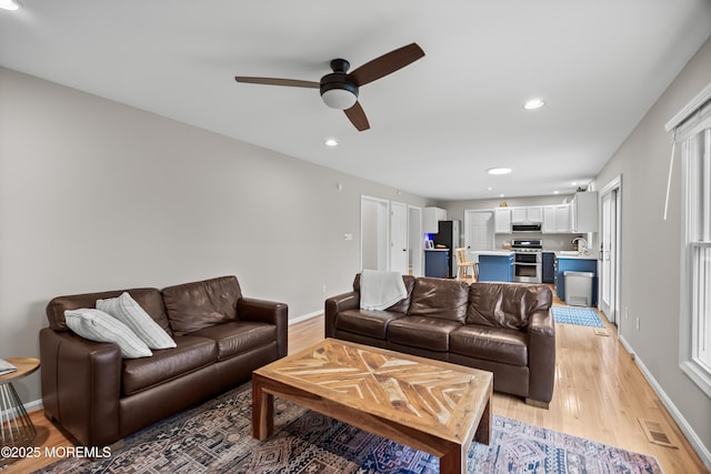 69 Eayrestown Rd, Medford, NJ 08055 - living area featuring light wood finished floors, a ceiling fan, and recessed lighting