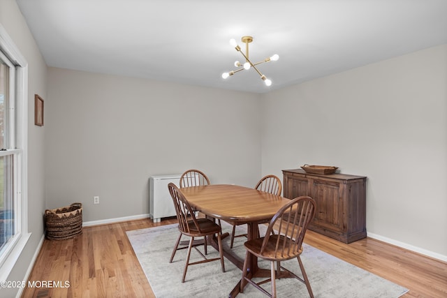69 Eayrestown Rd, Medford, NJ 08055 - dining area featuring light wood finished floors, a chandelier, and healthy amount of natural light