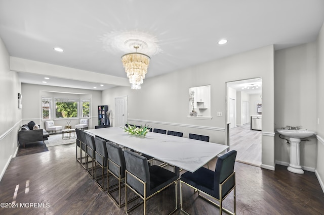 1501 Pine Park Ave, Lakewood, NJ 08701 - dining space with dark wood-type flooring, recessed lighting, a chandelier, and baseboards