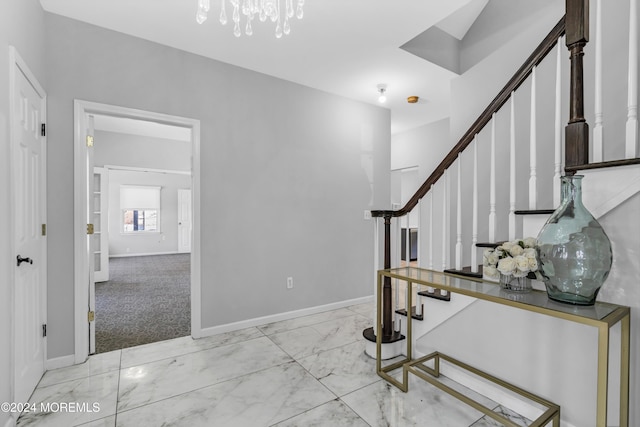 1501 Pine Park Ave, Lakewood, NJ 08701 - foyer with marble finish flooring, stairs, baseboards, and a chandelier