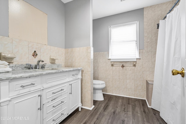 1501 Pine Park Ave, Lakewood, NJ 08701 - bathroom with tile walls, vanity, toilet, wood finished floors, and a shower with curtain