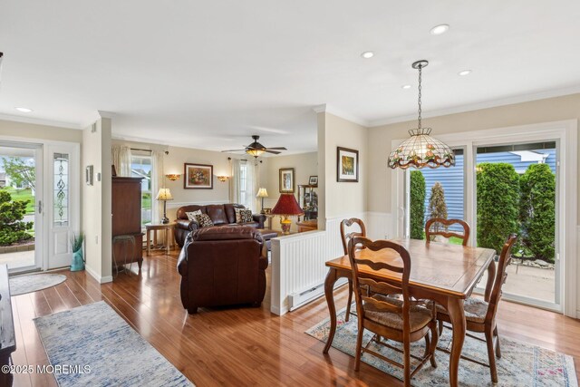 10 Weybridge Pl, Manchester, NJ 08759 - dining area featuring ornamental molding, a wainscoted wall, wood finished floors, recessed lighting, and a ceiling fan