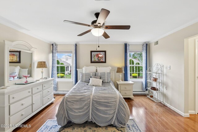 10 Weybridge Pl, Manchester, NJ 08759 - bedroom with ornamental molding, multiple windows, wood finished floors, and baseboards