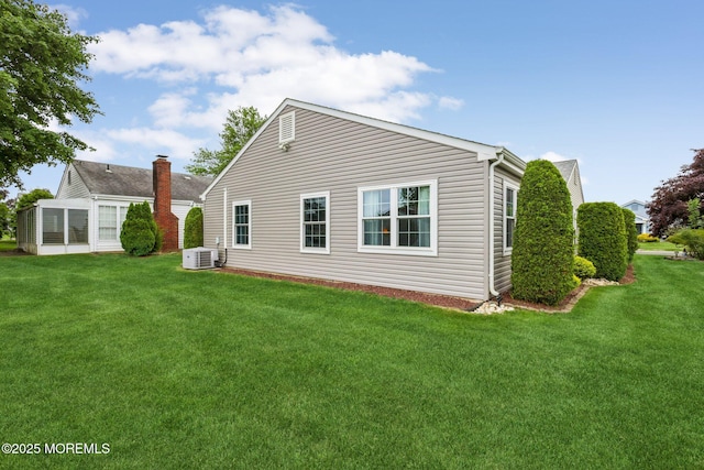 10 Weybridge Pl, Manchester, NJ 08759 - back of property featuring a lawn and a cooling unit