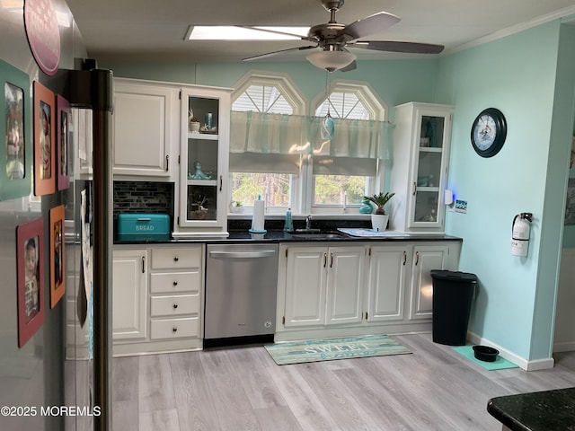 37 Pine Ridge Blvd, Whiting, NJ 08759 - kitchen featuring stainless steel dishwasher, ceiling fan, white cabinetry, lofted ceiling, and light wood finished floors