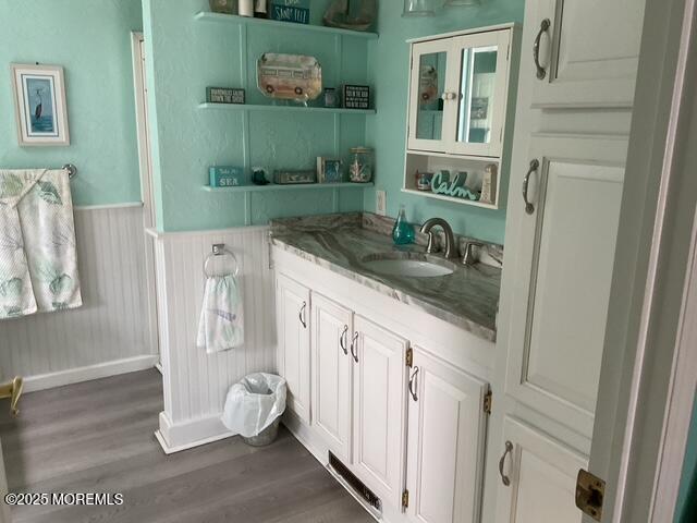37 Pine Ridge Blvd, Whiting, NJ 08759 - bathroom featuring wainscoting, vanity, and wood finished floors
