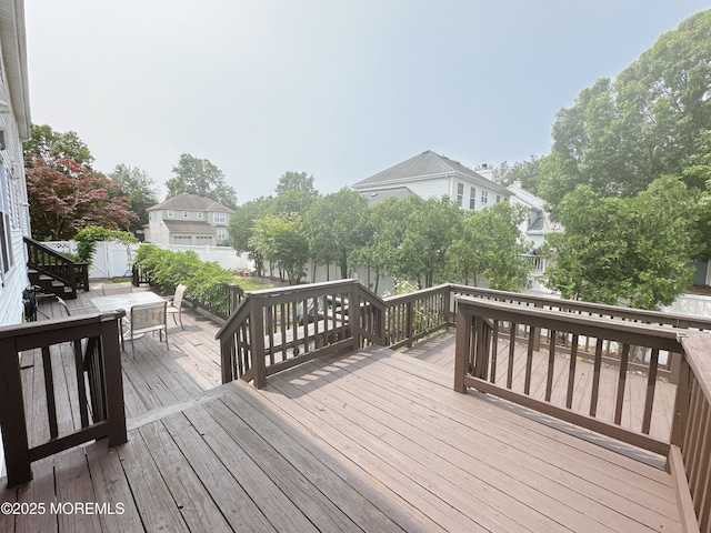 22 Enclosure Dr, Morganville, NJ 07751 - wooden deck featuring outdoor dining area
