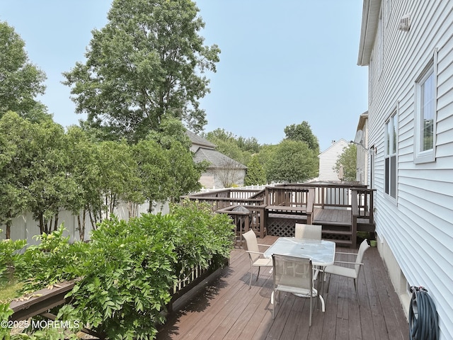 22 Enclosure Dr, Morganville, NJ 07751 - wooden terrace with outdoor dining space