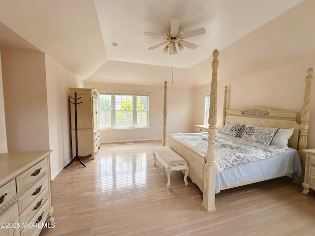 22 Enclosure Dr, Morganville, NJ 07751 - bedroom with light wood finished floors, a ceiling fan, and a raised ceiling