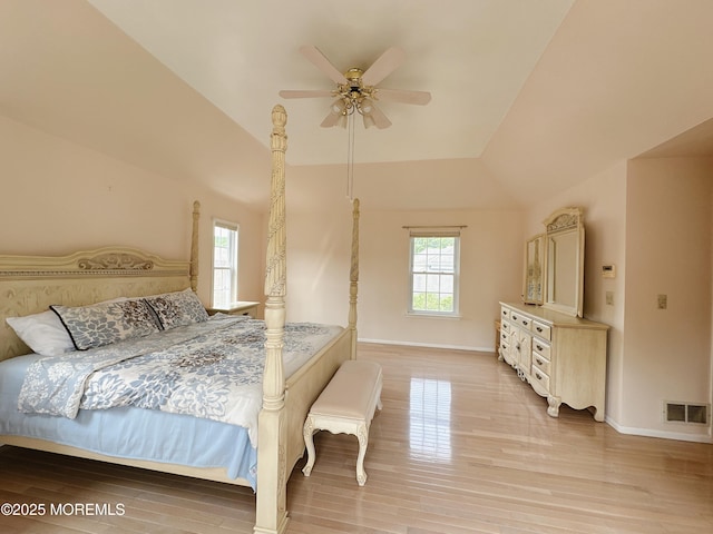 22 Enclosure Dr, Morganville, NJ 07751 - bedroom with multiple windows, light wood finished floors, a ceiling fan, and high vaulted ceiling