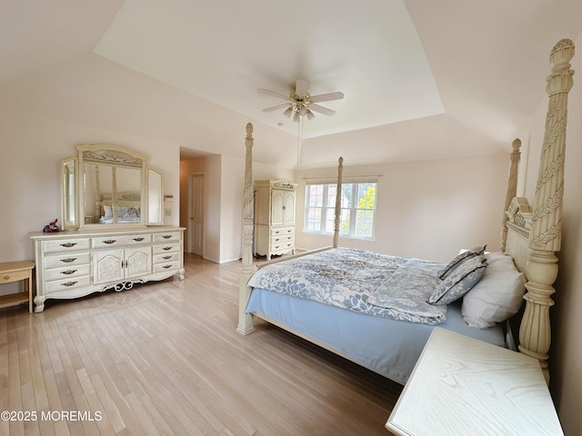 22 Enclosure Dr, Morganville, NJ 07751 - bedroom with a raised ceiling, light wood-type flooring, and a ceiling fan