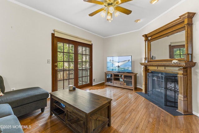 22 Enclosure Dr, Morganville, NJ 07751 - living room with hardwood / wood-style floors, ceiling fan, crown molding, and a fireplace with flush hearth