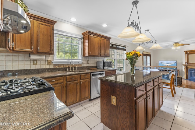22 Enclosure Dr, Morganville, NJ 07751 - kitchen featuring appliances with stainless steel finishes, range hood, tasteful backsplash, a center island, and pendant lighting