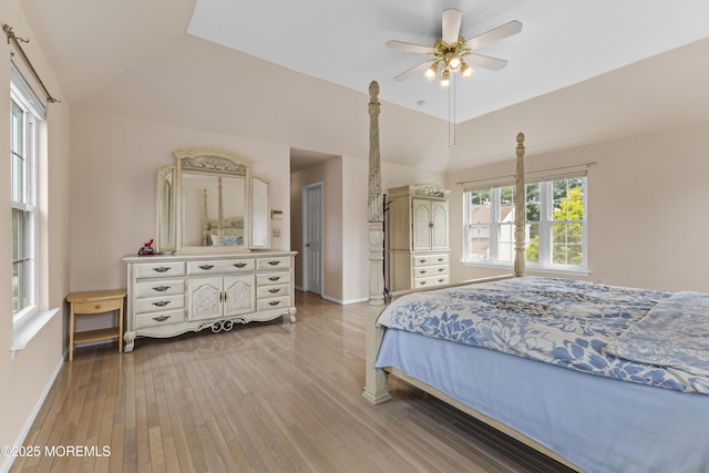 22 Enclosure Dr, Morganville, NJ 07751 - bedroom with hardwood / wood-style floors, a ceiling fan, and lofted ceiling