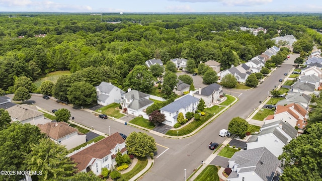 22 Enclosure Dr, Morganville, NJ 07751 - aerial perspective of suburban area featuring a heavily wooded area
