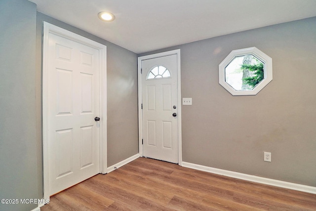 503 Center St, Forked River, NJ 08731 - foyer with baseboards, light wood-type flooring, plenty of natural light, and recessed lighting