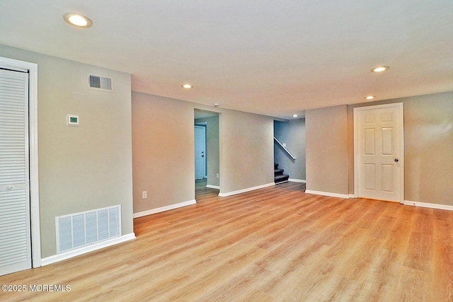 503 Center St, Forked River, NJ 08731 - empty room with recessed lighting, light wood-style floors, stairway, and baseboards